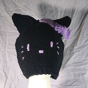 Black cat hat with a bow